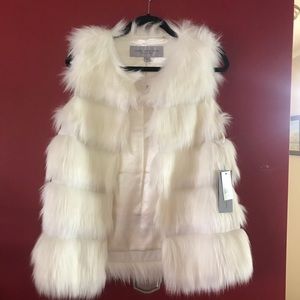 Super cute Faux Fur Vest!  Just in time for the holidays!